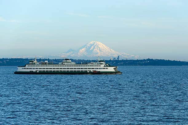 Seattle Washington USA   May   A ferry Walla Walla is on its route crossing Puget Sound between Edmonds and Kingston with Mount Rainier and Seattle Downtown in the background