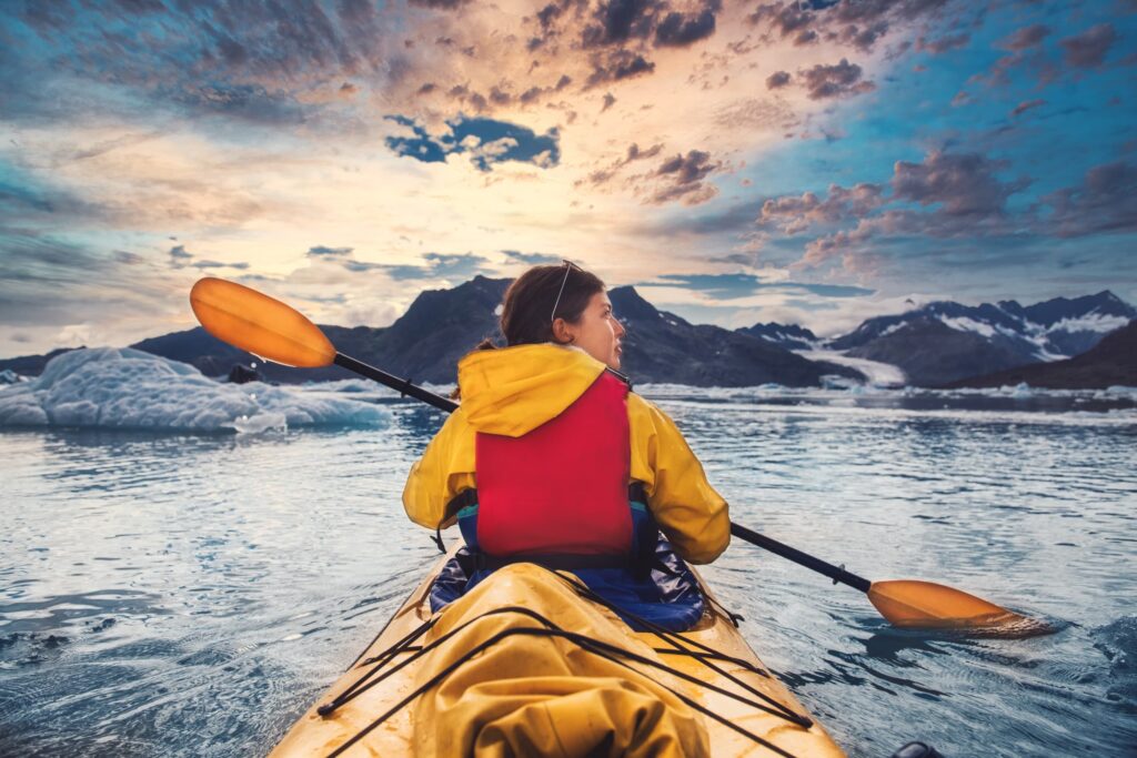 wilderness-sea-kayaking-adventure-sitka | Sea Quest Kayak Tours women paddling in sitka wilderness on a sea kayaking adventure