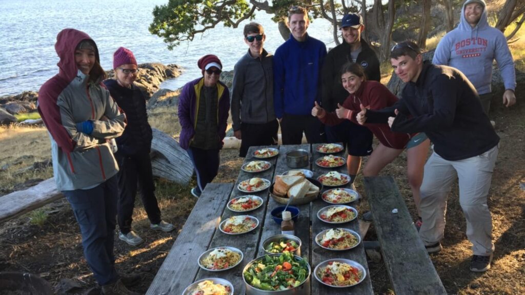 Group enjoying a meal outdoors.