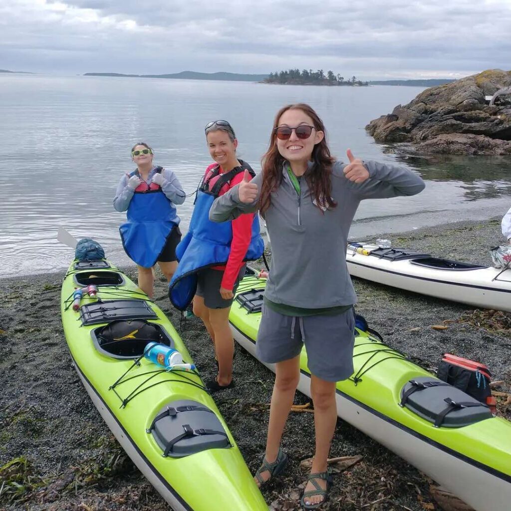 Why Lopez Island Is a Favorite for Calm, Scenic Paddling 2 Family enjoying kayaking by the shore