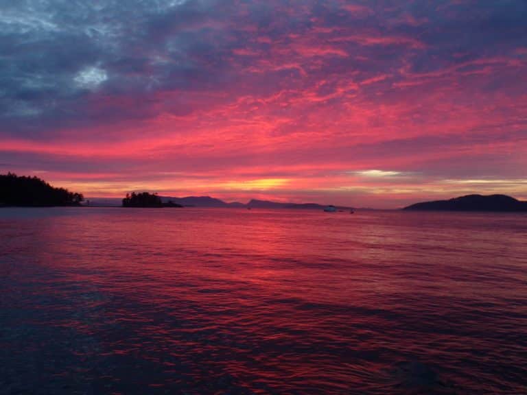 sunset on kayak camping trips